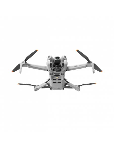 Drone DJI Mini 4 Pro en vuelo, vista desde abajo.